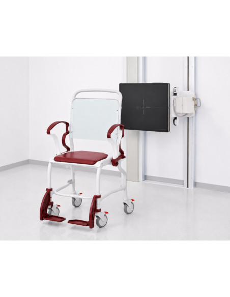 Chair with radiolucent backrest and foam seat two armrests and retractable footrests
